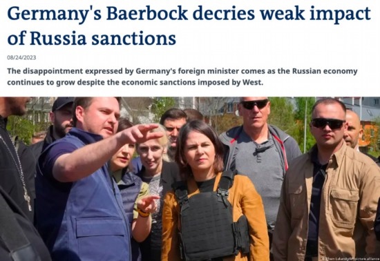 △“德國之聲”網(wǎng)站報(bào)道截圖（題圖中間為貝爾伯克）